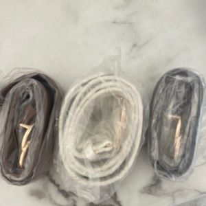 3 black, white, and brown women’s belts